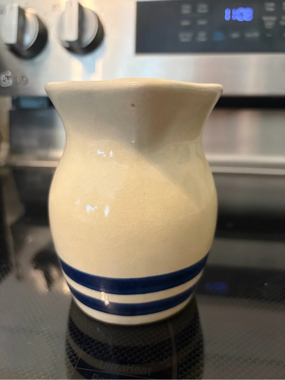 Robinson-Ransbottom Cream Ceramic Pitcher with Navy Blue Bands